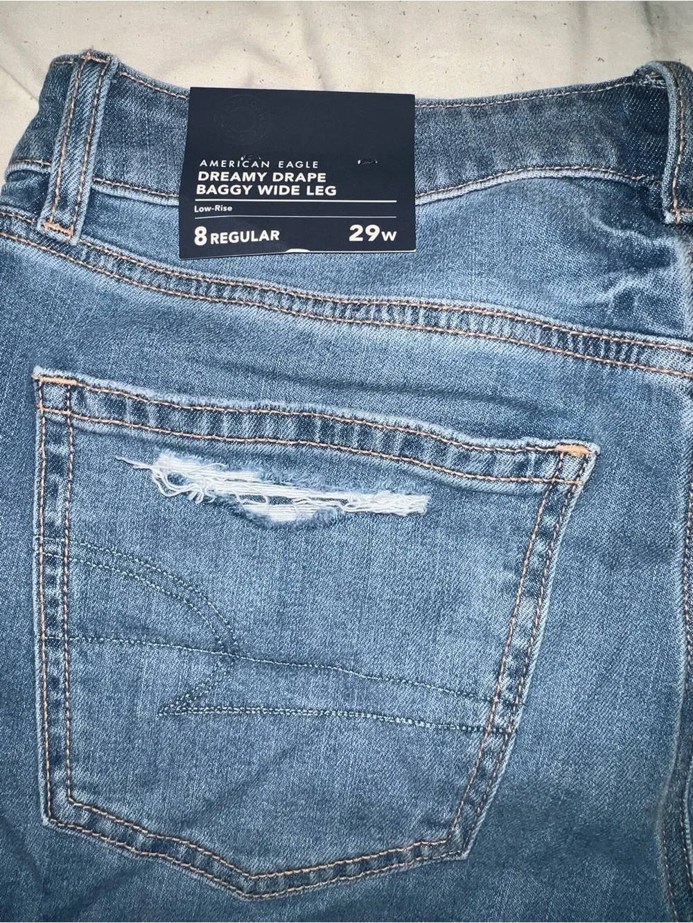 American Eagle Dreamy Drape Stretch Low Rise Baggy Wide Leg Jean - Picture 8 of 13